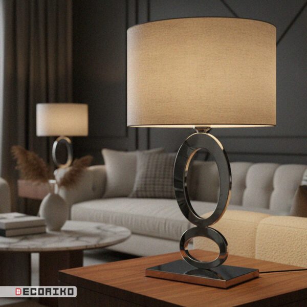 آباژور رومیزی استیل نقره ای مدل بیضی در دکوراسیون اتاق نشیمن