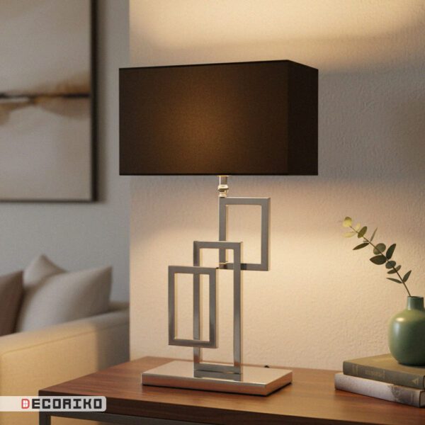 آباژور رومیزی نقره ای مدرن مدل مشبک روی میز چوبی