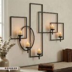 جاشمعی دیواری فلزی مشکی مات ۵ شعله با طراحی هندسی روی دیوار روشن