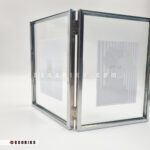 قاب عکس رومیزی فلزی نقره‌ای کتابی سایز 16 در 21 نمای پشت