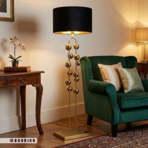 جزئیات بدنه آباژور ایستاده استیل طلایی با طراحی گوی‌های فلزی و پایه مستطیلی براق