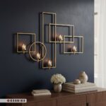 عکس ژورنالی جاشمعی دیواری ۵ شعله استیل طلایی در فضای کم نور