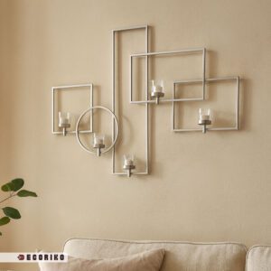 جاشمعی دیواری استیل نقره ای ۵ شعله با طراحی مدرن روی دیوار پذیرایی