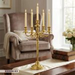 شمعدان رومیزی طلایی بلند مناسب دکوراسیون پذیرایی و روی میز جلو مبلی