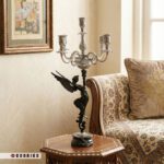 شمعدان ۵ شعله نقره ای طرح فرشته ایستاده روی پایه سنگی مرمر