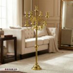 شمعدان بزرگ ۹ شعله طلایی مدل سیلوین در دکوراسیون پذیرایی