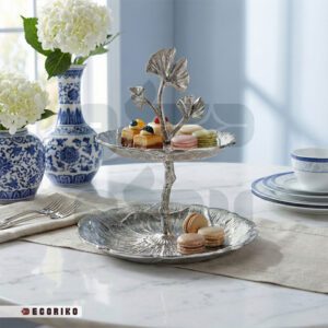شیرینی خوری دو طبقه سیلور طرح برگ مدل لوتوس روی میز پذیرایی